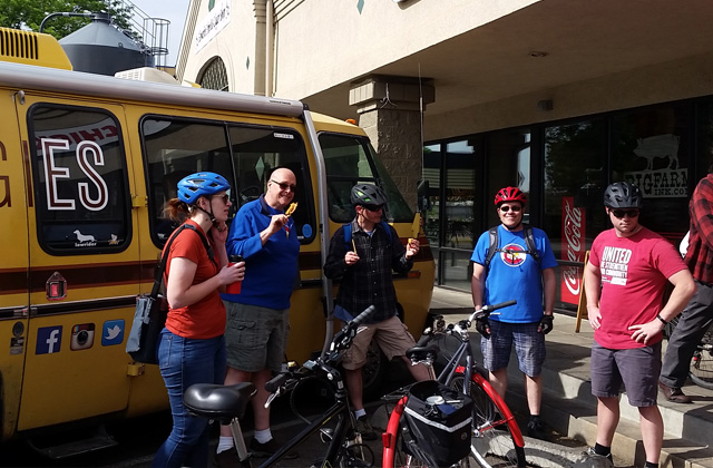 Bike to work day with Smokey the Bear.